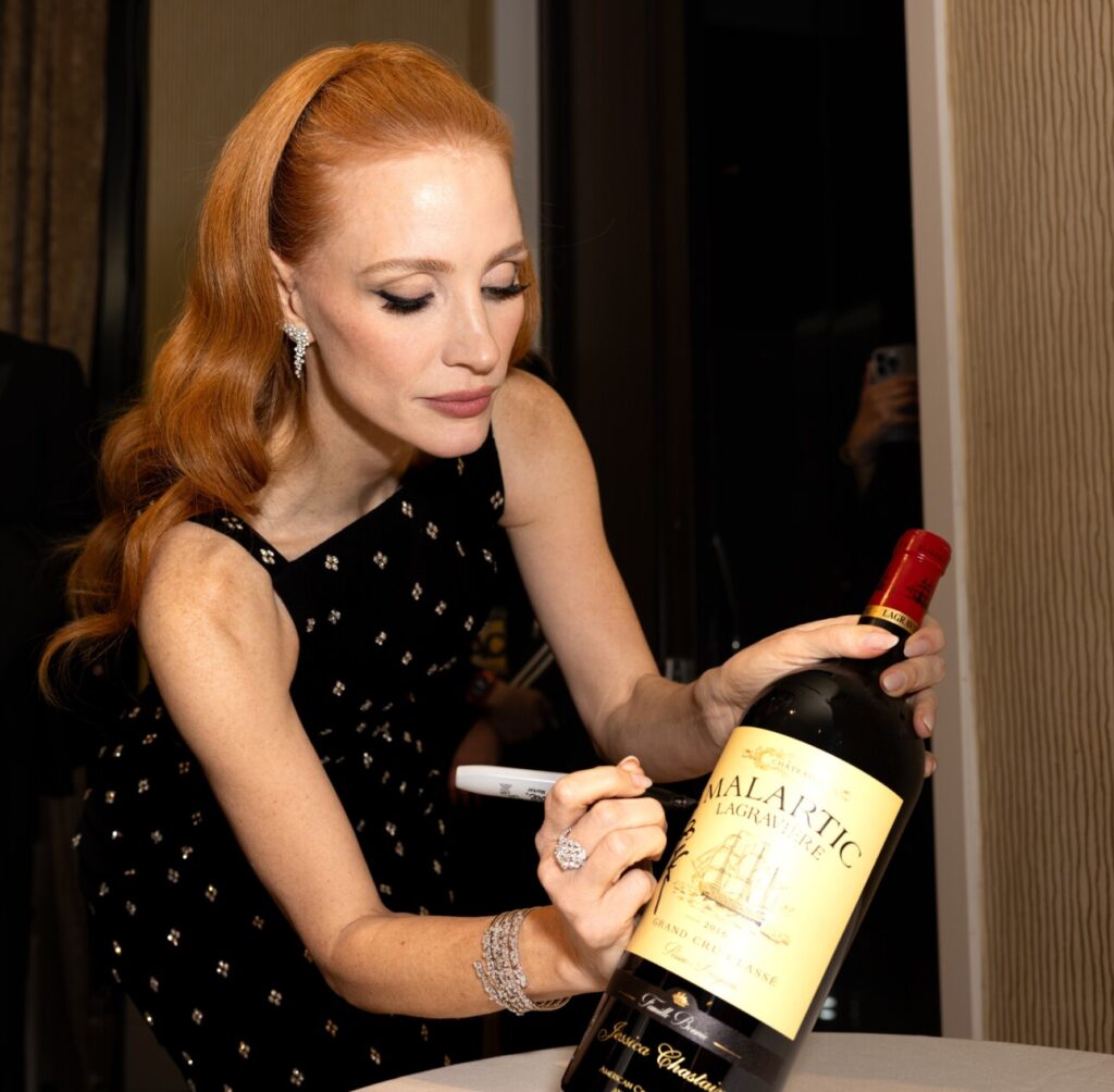 Jessica Chastain signing Malartic Magnum Dec 6 2024 @bryanbeasley